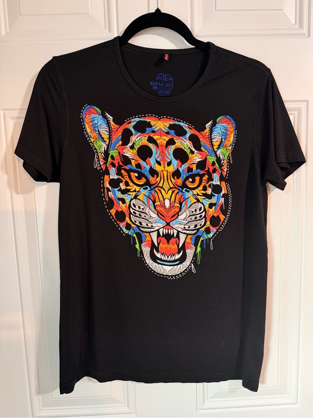 Black Short-Sleeve Tee with Vibrant Multicolor Leopard Head
